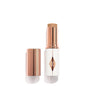 Charlotte Tilbury Unreal Skin Tint & Sheer Glow Hydrating Foundation Stick - Cream Foundation Makeup with Sheer-to-Light Coverage & a Buildable Formula - Blurring, Smoothing & Nourishing - 7.5 Medium